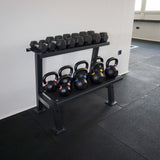 IRONSTAR storage system for hex dumbbells and kettlebells.