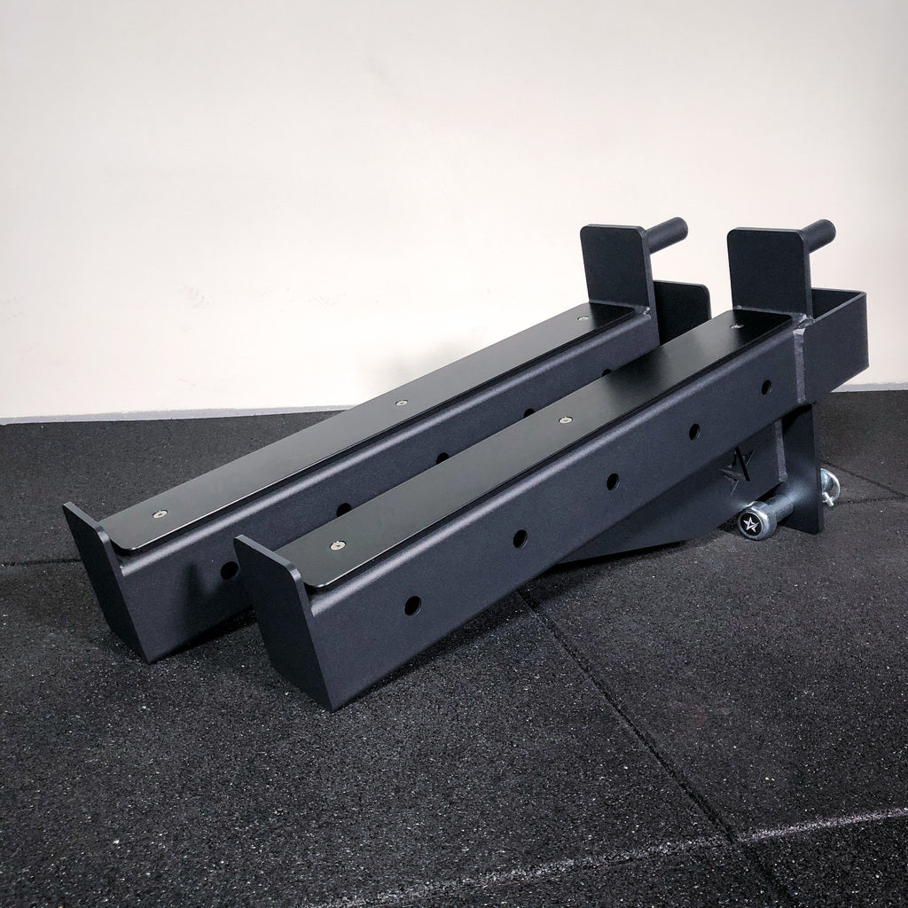Safety arms Add-on for power racks, squat stands and wall mounts used in home gyms or professional / commercial fitness studios. 