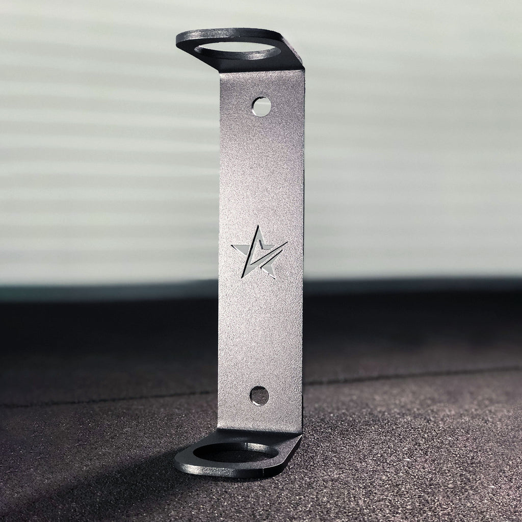 Single barbell holder Add-on for power racks, squat stands and wall mounts used in home gyms or professional / commercial fitness studios. 