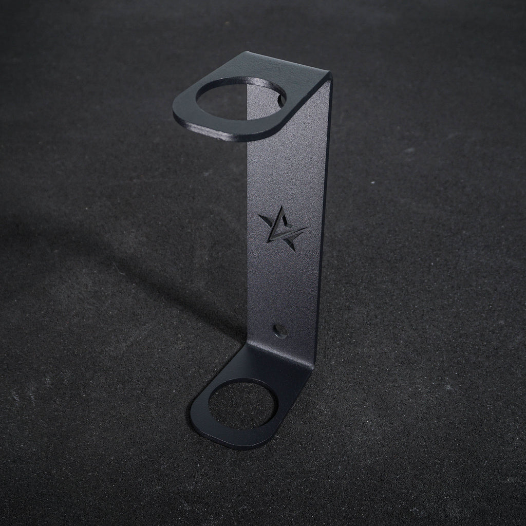 Single barbell holder Add-on for power racks, squat stands and wall mounts used in home gyms or professional / commercial fitness studios. 
