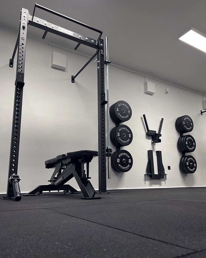 IRONSTAR wall storage for bumper plates.