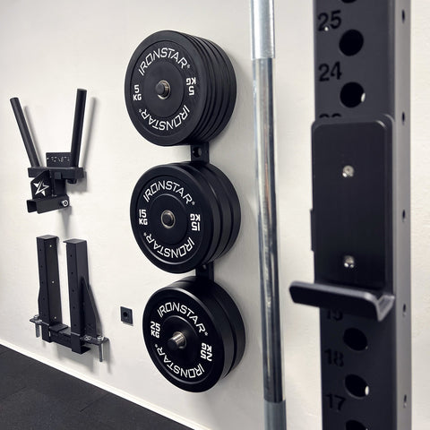 IRONSTAR wall storage for bumper plates.